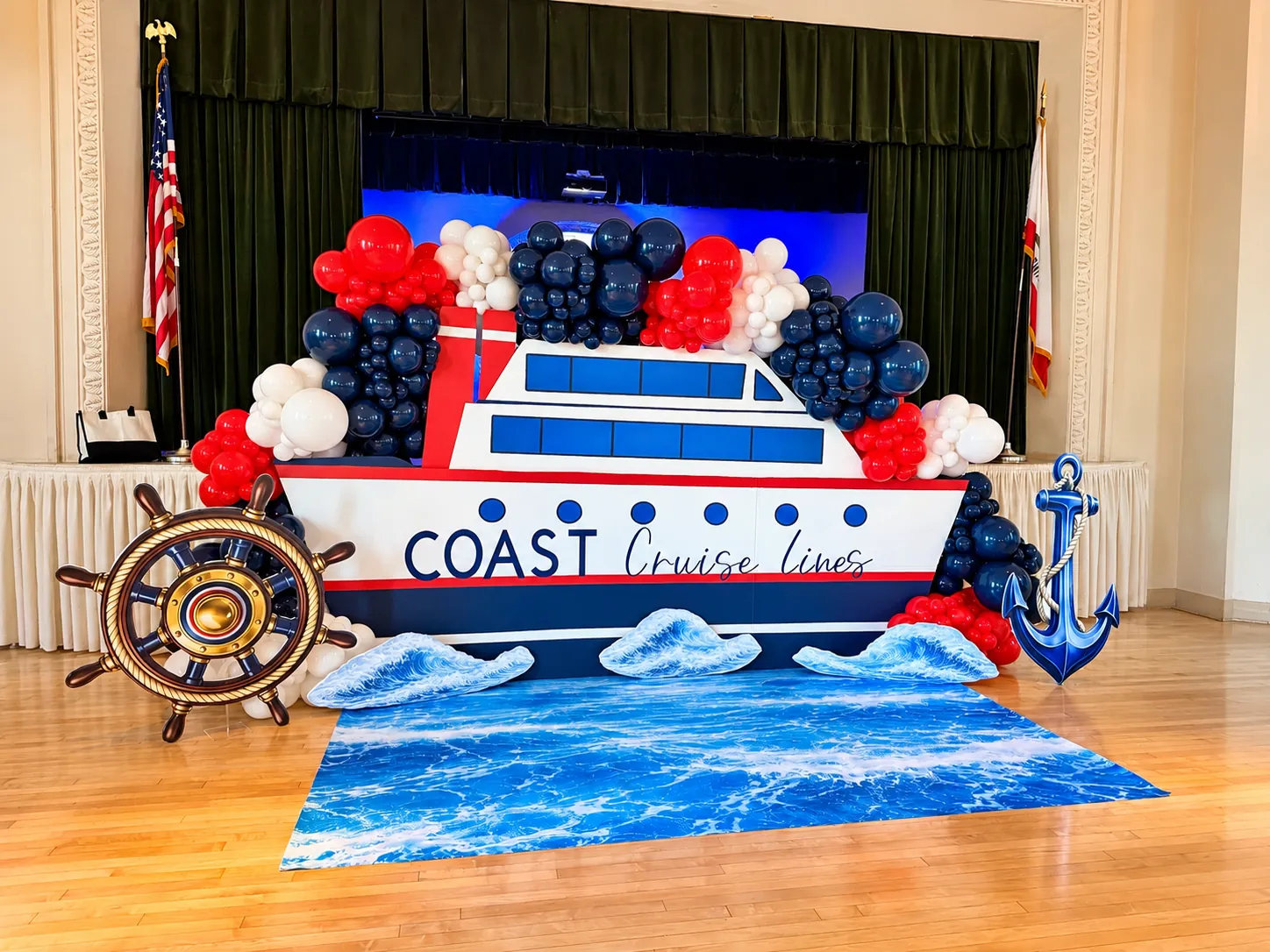 Coast Cruise Lines ship prop with ship wheel, anchor and balloons