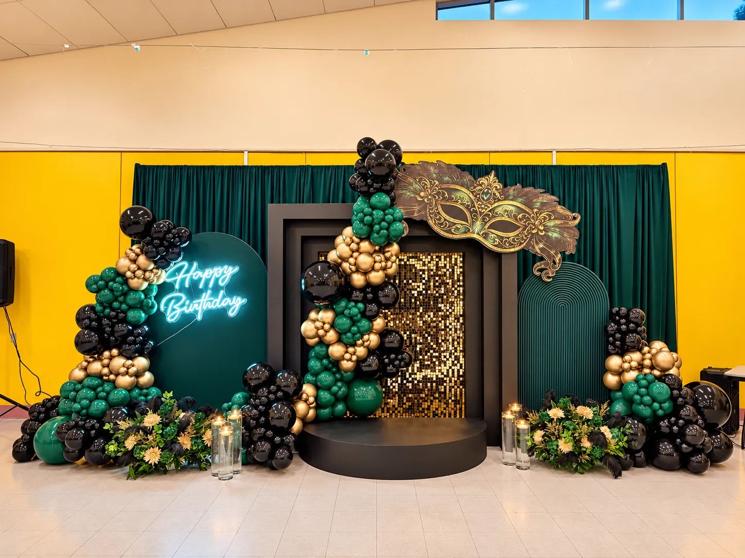 Emerald and gold masquerade birthday backdrop with neon sign