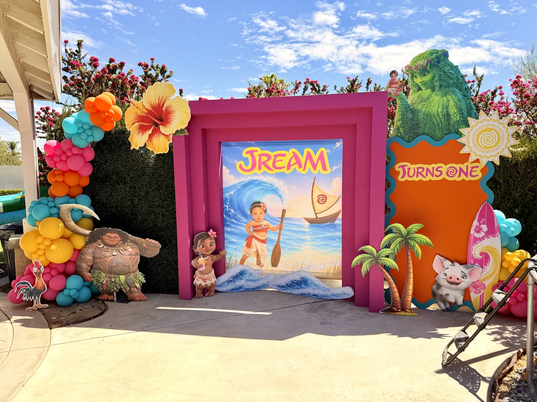 Moana themed printed backdrop with balloons